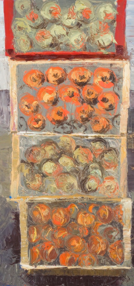 Crates of pomegranates, apples and peaches